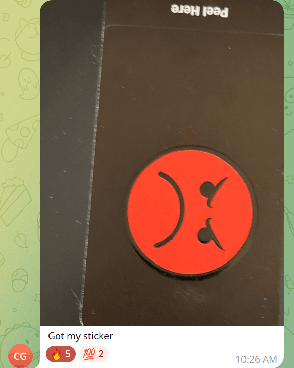 $MAD sticker on laptop
